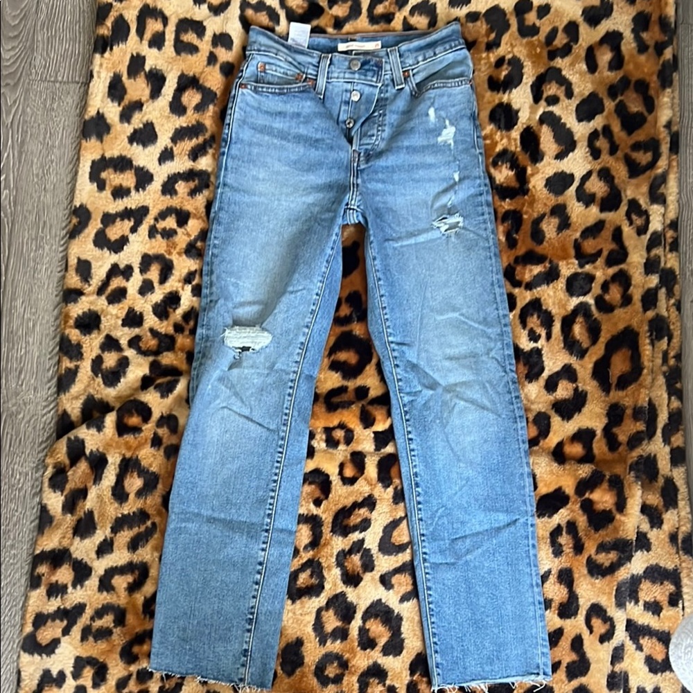 Distressed Blue Levi’s Jeans